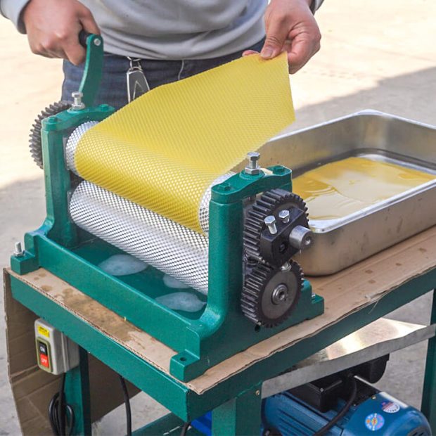 Manual beeswax embossing machine